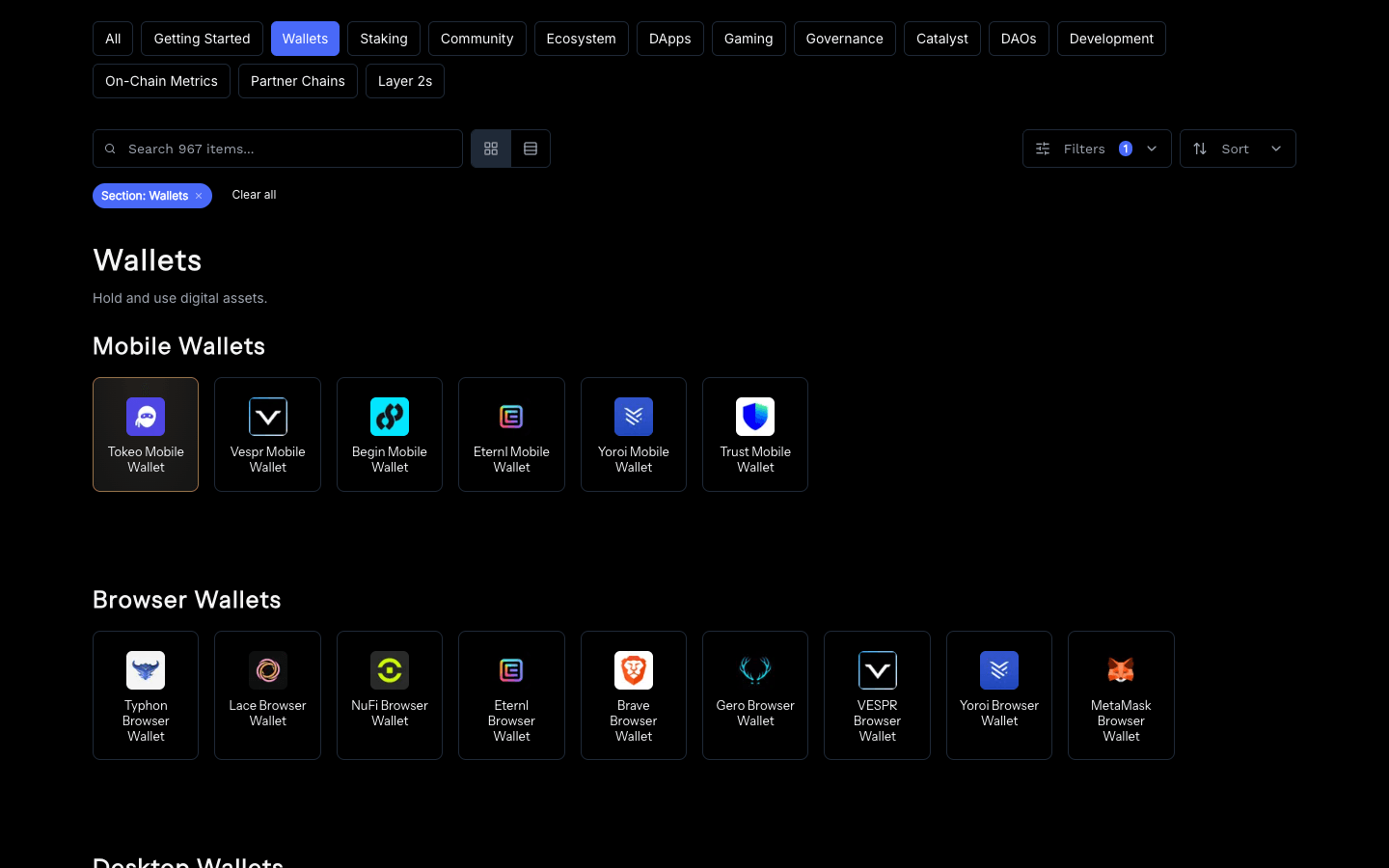Featured placement in dark mode showing Tokeo with gold styling on the Projects directory page
